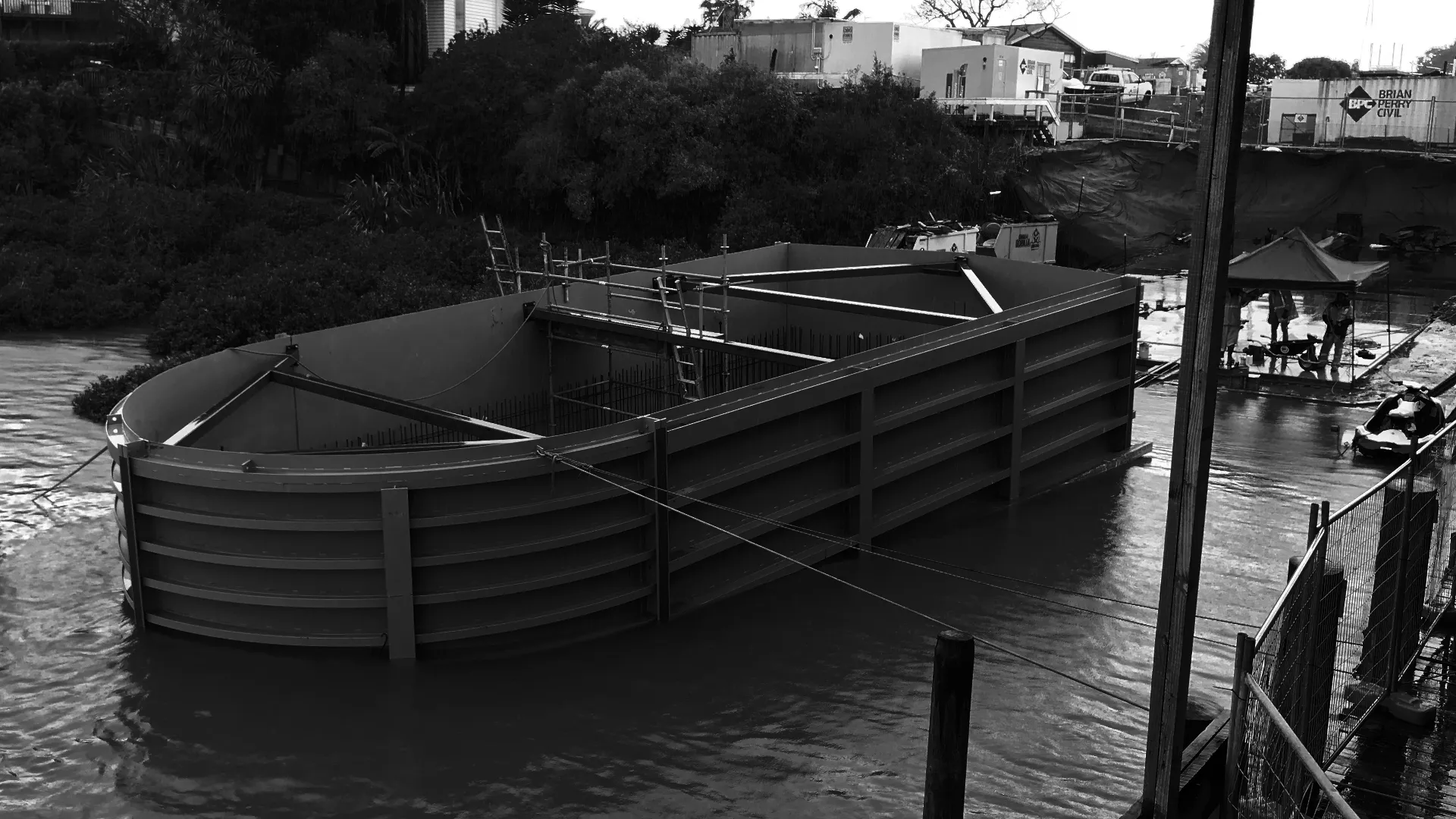 Steel fabrication workshop with sparks flying